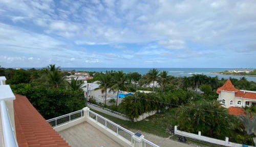 2 BR & 1WR Suite at Villa Costa Verde near Playa Cofresi, Puerto Plata with a pool, balcony, and a rooftop terrace