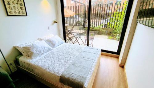 Acogedor apartamento con jardín