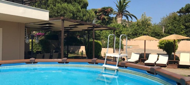 Athenian Riviera Family House