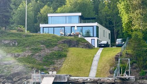 Beachfront apartment with private swimming dock