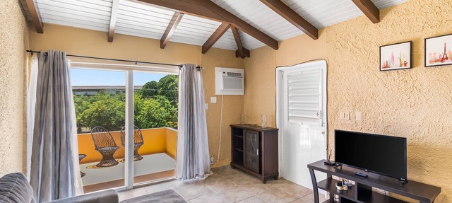 Caribbean View Style 1 Bedroom Condo by RedAwning