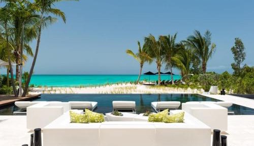 Cool beachfront fully staffed villa with unique architecture