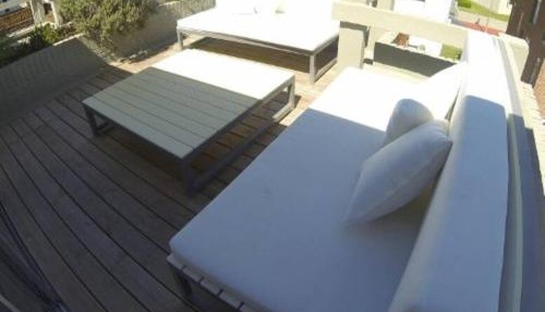 Cozy Apt 2 blocks from the ocean WiFi AC Parking and private terrace with a BBQ
