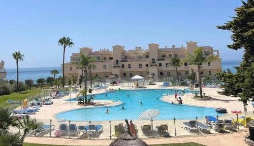 La Cala gorgeous 2 bedroom apartment with stunning gardens, pools and sea views