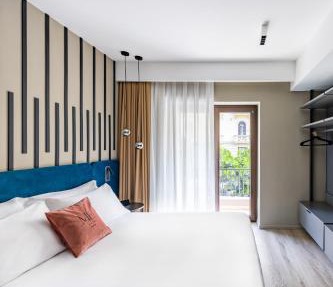 MH SUITES Plebiscito