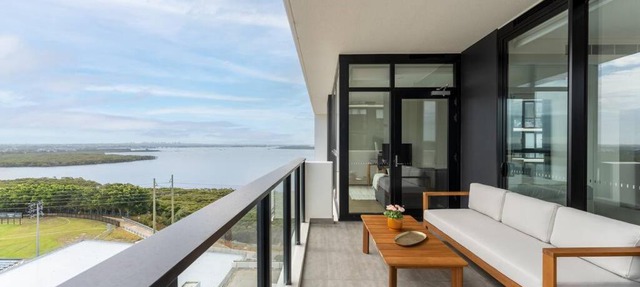 Modern 2BR with Balcony, Pool & Parking