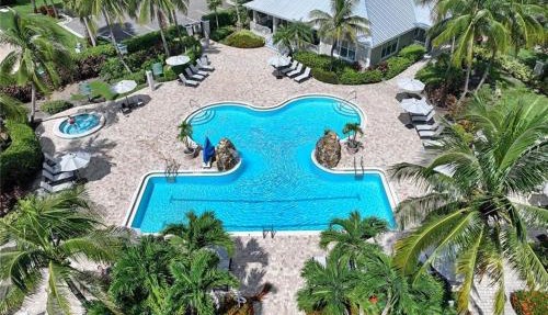 Spacious 2BR Lely Resort Condo with Lake View steps to Pool Hot Tub Gym