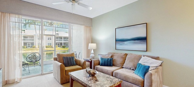 Water view condo w/access to community amenities, wifi, & outdoor private patio